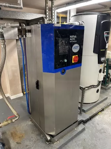 Nilfisk Delta Booster pressure washer system after full bi-annual service, cleaned, serviced, and ready for operation in Stratford.